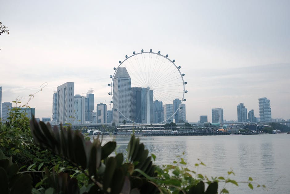 Capture of Singapore's modern skyline with the Singapore Flyer and Marina Bay waterfront.